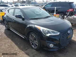 2016 Hyundai Veloster Turbo with VIN KMHTC6AE8GU255625, listed as a IAAI auction lot 41479623 with 94,011 mi miles. Bid and sale history available at carsss.com. Image 1.