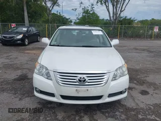 2010 Toyota Avalon XL with VIN 4T1BK3DB8AU354533, listed as a IAAI auction lot 41802797 with 117,956 mi miles and . Bid and sale history available at carsss.com. Image 12.