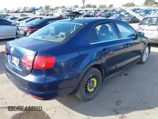 2014 Volkswagen Jetta TDI w/Premium with VIN 3VW3L7AJ7EM367323, listed as a IAAI auction lot 41419079 with 166,511 mi miles and . Bid and sale history available at DreamBid. Image 4.
