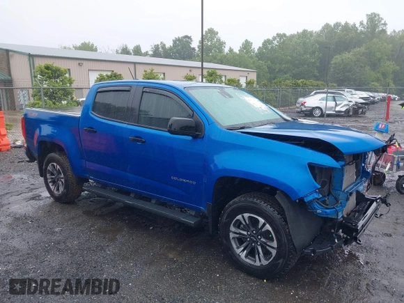 2022 Chevrolet Colorado 4WD Z71 z VIN 1GCGTDEN7N1124379, wystawiony jako IAAI lot #42372796 z przebiegiem 60 943 mil mil oraz . Historia ofert i sprzedaży dostępna na DreamBid. Obrazek 1.