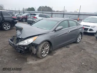 2013 Hyundai Sonata SE with VIN 5NPEC4AC4DH770868, listed as a IAAI auction lot 41504401 with 220,124 mi miles. Bid and sale history available at carsss.com. Image 2.