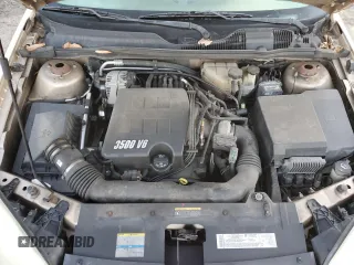 2005 Chevrolet Malibu Maxx LS z VIN 1G1ZT64825F323562, wystawiony jako Copart lot #48213755 z przebiegiem 111 297 mil mil oraz Szkoda całkowita • Salvage title. Historia ofert i sprzedaży dostępna na DreamBid. Obrazek 13.