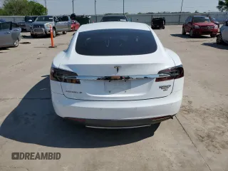 2014 Tesla Model S 60 с VIN 5YJSA1H16EFP45983, выставлен на аукционе Copart как лот 52256635 с пробегом 159 948 миль миль и Списание • Salvage title. История ставок и продаж доступна на DreamBid. Изображение 6.