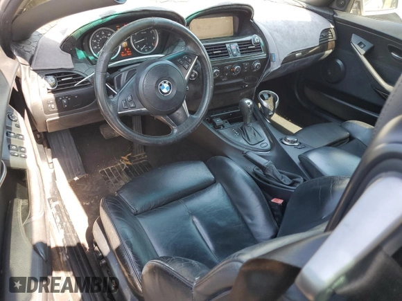 2006 BMW 6 Series 650Ci z VIN WBAEK13416CN78990, wystawiony jako Copart lot #47316205 z przebiegiem 99 173 mil mil oraz Czysty tytuł • Clean title. Historia ofert i sprzedaży dostępna na DreamBid. Obrazek 8.