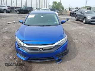 2017 Honda Civic LX z VIN 19XFC2F58HE058408, wystawiony jako IAAI lot #42341904 z przebiegiem 93 533 mil mil oraz . Historia ofert i sprzedaży dostępna na DreamBid. Obrazek 12.