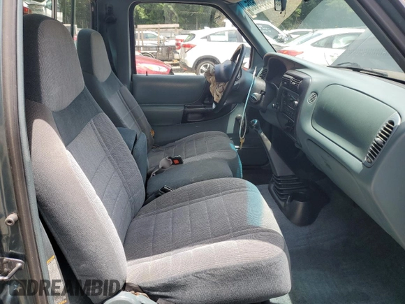 1997 Ford Ranger XLT z VIN 1FTCR10A1VUB21797, wystawiony jako Copart lot #59839605 z przebiegiem 145 266 mil mil oraz Szkoda całkowita • Salvage title. Historia ofert i sprzedaży dostępna na DreamBid. Obrazek 10.