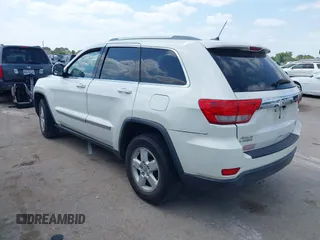 2011 Jeep Grand Cherokee 70th Anniversary with VIN 1J4RR4GG4BC562003, listed as a IAAI auction lot 42022419 with 231,786 mi miles. Bid and sale history available at carsss.com. Image 3.