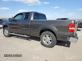 2005 Ford F-150 XLT with VIN 1FTPX12575NB60735, listed as a Copart auction lot 49598075 with 153,360 mi miles and Salvage title. Bid and sale history available at DreamBid. Image 2.
