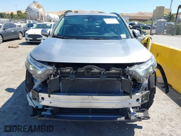 2022 Toyota RAV4 Hybrid XLE with VIN 4T3RWRFV2NU066761, listed as a IAAI auction lot 42784621 with 24,711 mi miles and . Bid and sale history available at DreamBid. Image 13.
