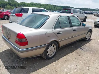 1997 Mercedes-Benz C with VIN WDBHA23E8VF615210, listed as a IAAI auction lot 42719257 with 193,390 mi miles and . Bid and sale history available at DreamBid. Image 4.