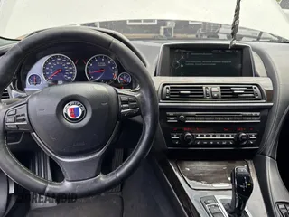 2015 BMW 6 Series 650i xDrive with VIN WBA6B4C57FD899926, listed as a Copart auction lot 54974505 with 63,570 mi miles and Salvage Title. Bid and sale history available at carsss.com. Image 9.