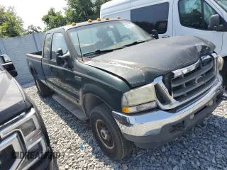 2002 Ford F-250 XL z VIN 1FTNX21F92EA00598, wystawiony jako Copart lot #58231845 z przebiegiem 178 784 mil mil oraz Szkoda całkowita • Salvage title. Historia ofert i sprzedaży dostępna na DreamBid. Obrazek 4.