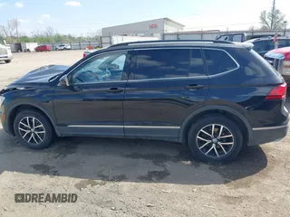 2021 Volkswagen Tiguan SE with VIN 3VV3B7AX3MM157702, listed as a IAAI auction lot 41888479 with 51,807 mi miles and . Bid and sale history available at DreamBid. Image 13.
