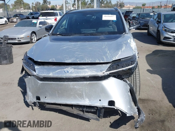 2024 Toyota bZ4X XLE with VIN JTMABACA7RA079957, listed as a IAAI auction lot 40566017 with 231 mi miles and . Bid and sale history available at DreamBid. Image 6.