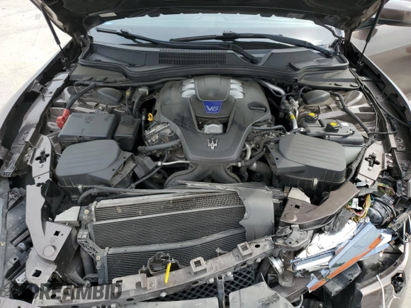 2014 Maserati Ghibli S Q4 with VIN ZAM57RTA6E1085708, listed as a Copart auction lot 53710095 with 110,799 mi miles and Salvage title. Bid and sale history available at DreamBid. Image 11.