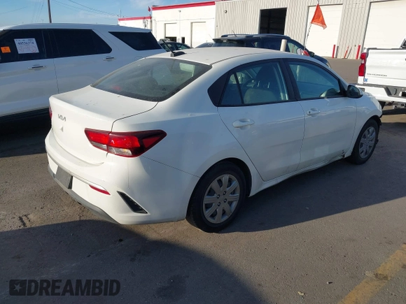 2022 Kia Rio S with VIN 3KPA24AD4NE498600, listed as a IAAI auction lot 40527357 with 59,614 mi miles and . Bid and sale history available at carsss.com. Image 4.