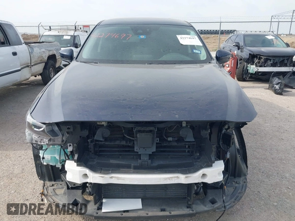 2019 Mazda CX-9 Touring with VIN JM3TCACY7K0334175, listed as a IAAI auction lot 42274697 with 39,751 mi miles and . Bid and sale history available at DreamBid. Image 12.