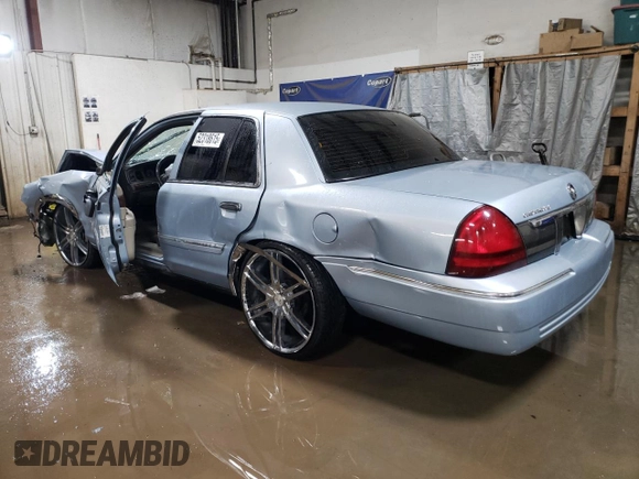 2010 Mercury Grand Marquis LS z VIN 2MEBM7FV1AX630474, wystawiony jako Copart lot #52318615 z przebiegiem Nie podano mil oraz Szkoda całkowita • Salvage title. Historia ofert i sprzedaży dostępna na DreamBid. Obrazek 2.