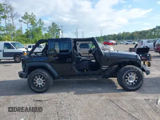 2016 Jeep Wrangler Unlimited Sport with VIN 1C4BJWDG6GL328550, listed as a IAAI auction lot 42741356 with 32,120 mi miles and . Bid and sale history available at DreamBid. Image 13.