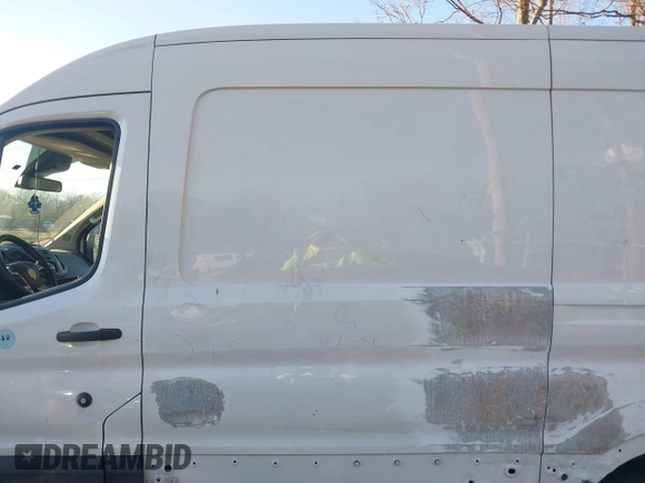 2019 Ford Transit with VIN 1FTYE1CM6KKA74930, listed as a IAAI auction lot 41020843 with 104,218 mi miles and . Bid and sale history available at DreamBid. Image 14.