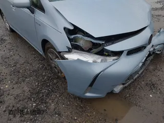 2016 Toyota Prius Two z VIN JTDZN3EUXGJ053220, wystawiony jako IAAI lot #42318675 z przebiegiem Nie podano mil oraz . Historia ofert i sprzedaży dostępna na DreamBid. Obrazek 19.
