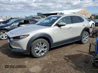 2022 Mazda CX-30 S Premium with VIN 3MVDMBDL4NM447276, listed as a Copart auction lot 47527985 with 4,577 mi miles and Salvage Title. Bid and sale history available at carsss.com. Image 1.