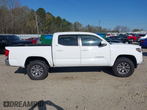 2017 Toyota Tacoma SR5 with VIN 5TFAZ5CN8HX044250, listed as a IAAI auction lot 41848524 with 53,379 mi miles and . Bid and sale history available at DreamBid. Image 13.