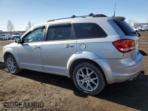 2012 Dodge Journey SXT with VIN 3C4PDCCG7CT135822, listed as a Copart auction lot 48820205 with 253,183 mi miles and Clean title. Bid and sale history available at DreamBid. Image 2.