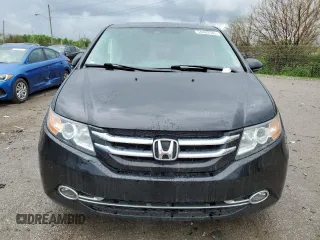 2014 Honda Odyssey Touring z VIN 5FNRL5H91EB063390, wystawiony jako Copart lot #54482545 z przebiegiem Nie podano mil oraz Szkoda całkowita • Salvage title. Historia ofert i sprzedaży dostępna na DreamBid. Obrazek 5.