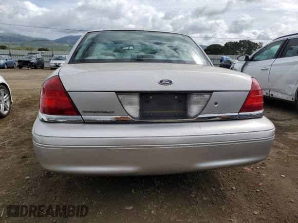 2004 Ford Crown Victoria LX с VIN 2FAHP74W04X168238, выставлен на аукционе Copart как лот 50842995 с пробегом 63 313 миль миль и Списание • Salvage title. История ставок и продаж доступна на DreamBid. Изображение 6.