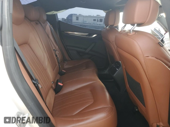 2017 Maserati Ghibli with VIN ZAM57XSA6H1233933, listed as a Copart auction lot 49089525 with 76,965 mi miles and Salvage Title. Bid and sale history available at carsss.com. Image 10.
