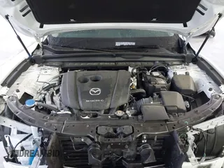 2024 Mazda CX-50 S Premium with VIN 7MMVABDM8RN185958, listed as a IAAI auction lot 41706138 with 17,397 mi miles and . Bid and sale history available at DreamBid. Image 10.