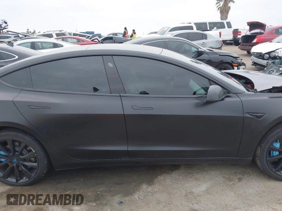 2019 Tesla Model 3 Mid Range with VIN 5YJ3E1EA8KF538083, listed as a IAAI auction lot 41891458 with 46,958 mi miles and . Bid and sale history available at carsss.com. Image 13.