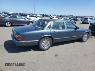 1998 Jaguar XJ with VIN SAJHX1247WC841374, listed as a Copart auction lot 51693595 with 109,509 mi miles and Clean Title. Bid and sale history available at DreamBid. Image 3.
