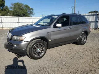 2005 BMW X5 4.4i with VIN 5UXFB53565LV15453, listed as a Copart auction lot 75830774 with 148,211 mi miles and Salvage Title. Bid and sale history available at carsss.com. Image 1.