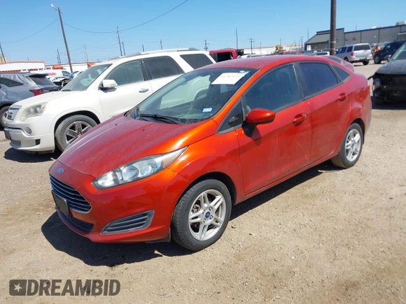 2018 Ford Fiesta SE with VIN 3FADP4BJ2JM139061, listed as a IAAI auction lot 41762233 with 84,132 mi miles. Bid and sale history available at carsss.com. Image 2.