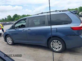 2015 Toyota Sienna XLE with VIN 5TDYK3DC3FS676919, listed as a IAAI auction lot 42475307 with 99,574 mi miles and . Bid and sale history available at DreamBid. Image 14.
