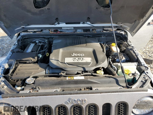 2013 Jeep Wrangler Unlimited Rubicon 10th Anniversary z VIN 1C4HJWFG3DL692993, wystawiony jako Copart lot #78599224 z przebiegiem 135 942 mil mil oraz Szkoda całkowita • Salvage title. Historia ofert i sprzedaży dostępna na DreamBid. Obrazek 12.