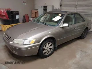 1999 Toyota Camry LE z VIN JT2BF28K7X0167855, wystawiony jako IAAI lot #41609230 z przebiegiem 242 398 mil mil oraz . Historia ofert i sprzedaży dostępna na DreamBid. Obrazek 17.