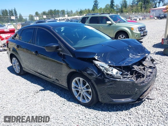 2018 Ford Focus SE z VIN 1FADP3FE5JL279274, wystawiony jako IAAI lot #42626587 z przebiegiem 92 110 mil mil oraz . Historia ofert i sprzedaży dostępna na DreamBid. Obrazek 1.