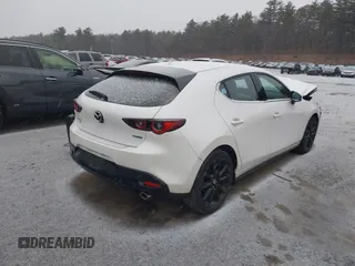 2022 Mazda Mazda3 Hatchback Premium with VIN JM1BPBML5N1501410, listed as a IAAI auction lot 41148682 with 8,541 mi miles. Bid and sale history available at carsss.com. Image 4.