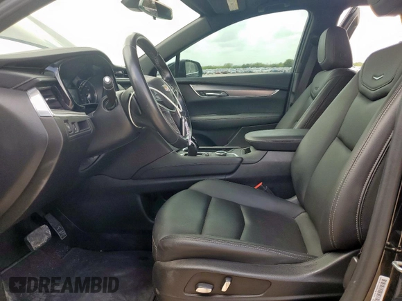2021 Cadillac XT5 FWD Luxury with VIN 1GYKNAR42MZ120996, listed as a Copart auction lot 63314655 with 49,977 mi miles and Salvage title. Bid and sale history available at DreamBid. Image 7.