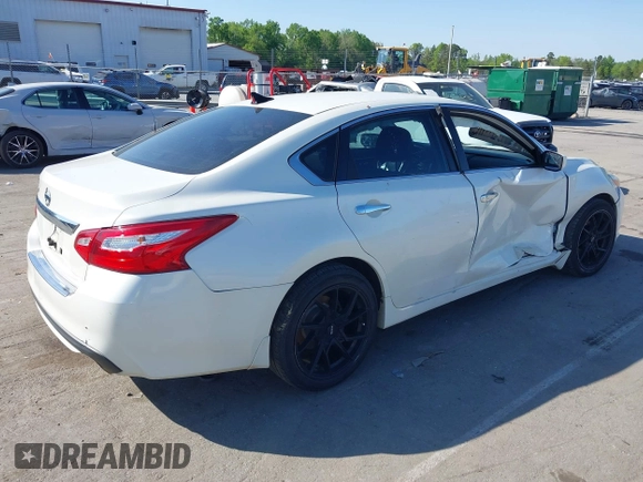 2016 Nissan Altima SR with VIN 1N4AL3AP0GC187327, listed as a IAAI auction lot 42001667 with 175,649 mi miles and . Bid and sale history available at carsss.com. Image 4.