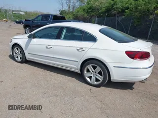 2013 Volkswagen CC Sport with VIN WVWBP7AN0DE523261, listed as a IAAI auction lot 42106039 with 136,105 mi miles. Bid and sale history available at carsss.com. Image 3.