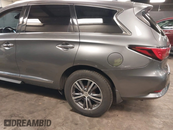 2016 Infiniti QX60 with VIN 5N1AL0MM1GC526389, listed as a IAAI auction lot 41704458 with 103,931 mi miles and . Bid and sale history available at DreamBid. Image 6.