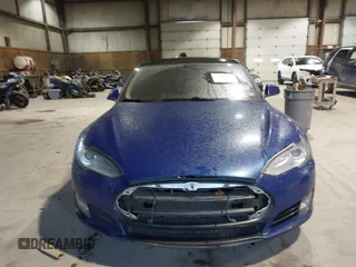 2014 Tesla Model S 60 with VIN 5YJSA1H1XEFP30497, listed as a IAAI auction lot 41294630 with 203,663 mi miles and . Bid and sale history available at DreamBid. Image 12.