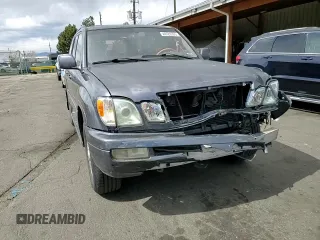 2003 Lexus LX 470 z VIN JTJHT00W633531685, wystawiony jako Copart lot #49729305 z przebiegiem 237 447 mil mil oraz Szkoda całkowita • Salvage title. Historia ofert i sprzedaży dostępna na DreamBid. Obrazek 12.