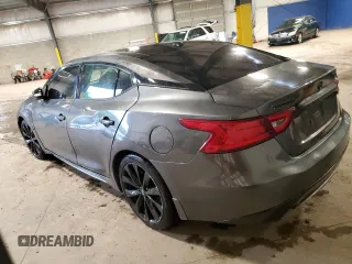 2017 Nissan Maxima SV with VIN 1N4AA6AP0HC383003, listed as a Copart auction lot 58060855 with 123,990 mi miles and Salvage title. Bid and sale history available at DreamBid. Image 2.