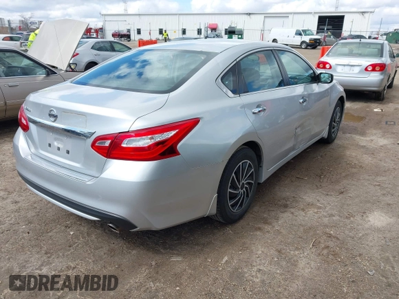 2016 Nissan Altima SR with VIN 1N4AL3AP4GC120813, listed as a IAAI auction lot 41974716 with 119,527 mi miles and . Bid and sale history available at DreamBid. Image 4.