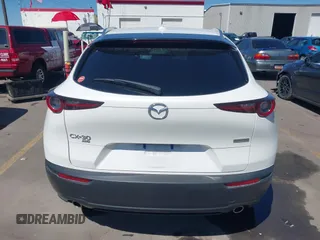 2024 Mazda CX-30 S Premium with VIN 3MVDMBDM8RM633580, listed as a IAAI auction lot 42152915 with 18,679 mi miles and . Bid and sale history available at DreamBid. Image 16.